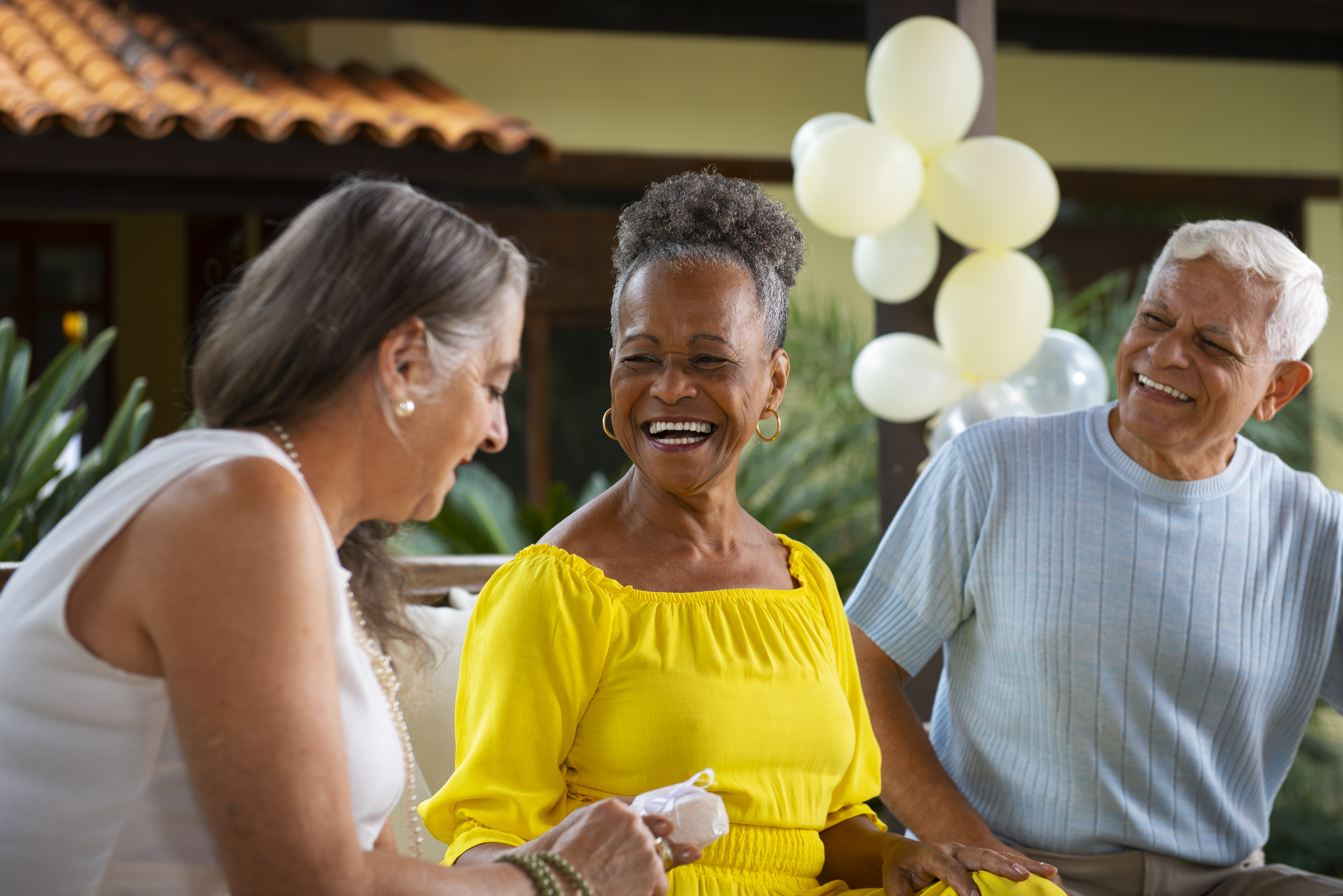Happy seniors receiving pharmacy care at home services